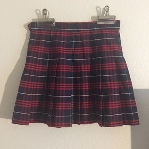Red and black pleated skirt